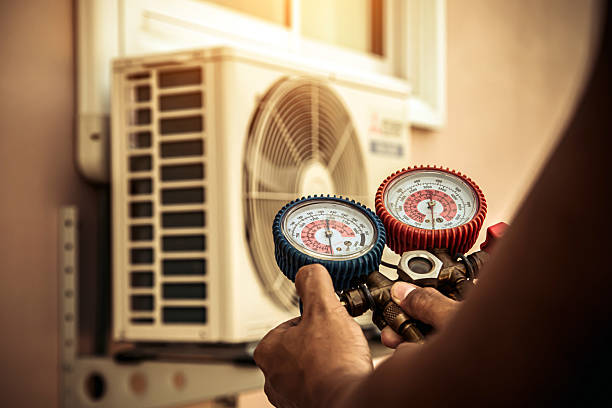 Professional Air Conditioning Service technician working in Wonder Lake, IL
